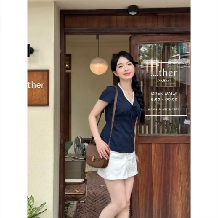 Váy chữ A cạp cao che hông đùi cho nàng dáng quả lê