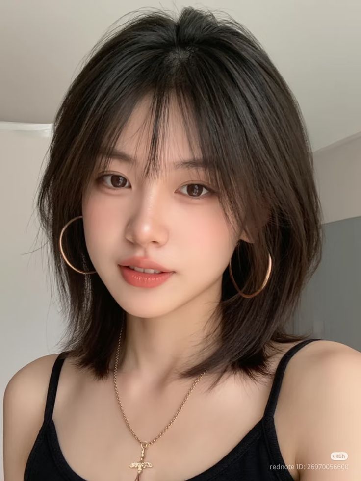 Mẫu tóc xoăn sóng lơi ngang vai 2