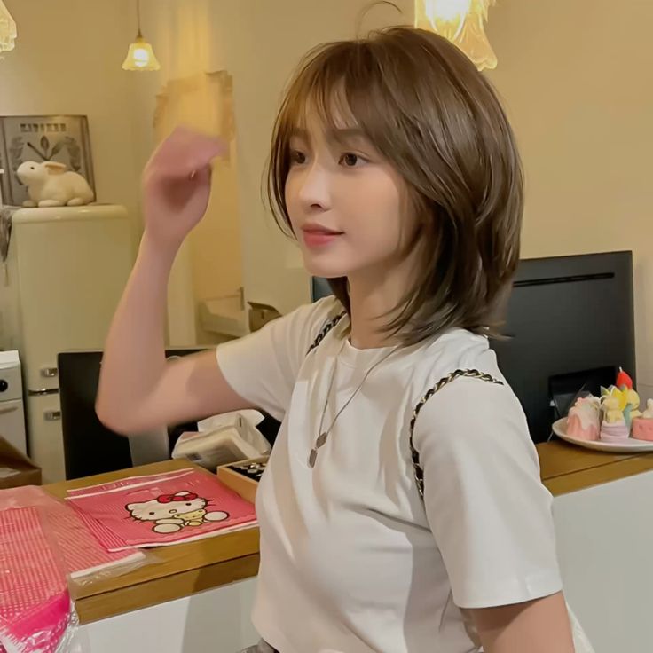 Mẫu tóc xoăn sóng lơi ngang vai 4